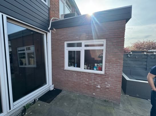 Buitenzijde van de aanbouw – foto 17