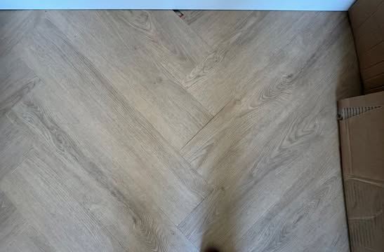 Detail van het visgraatpatroon en de vloeraansluitingen